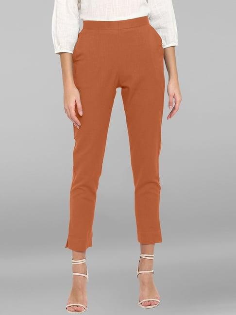 janasya orange regular fit mid rise pants