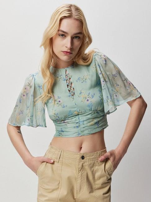 cover story turquoise floral print crop top