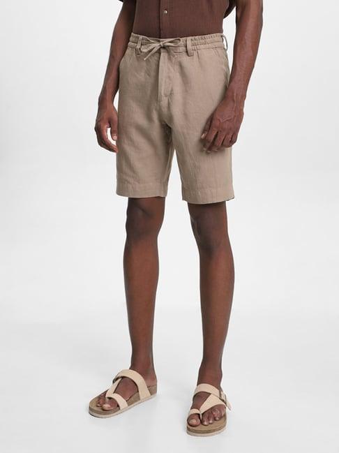 eta by westside solid beige slim fit shorts