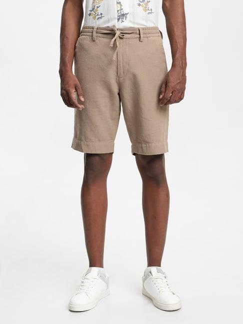 eta by westside solid taupe slim fit shorts