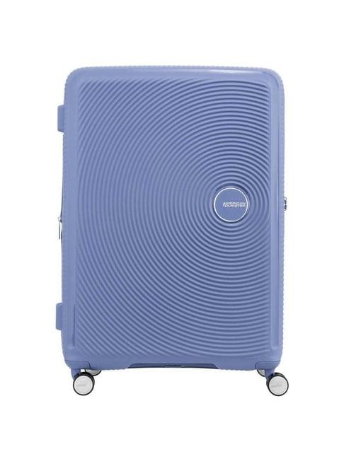 american tourister denim blue textured hard large trolley bag - 56 cm