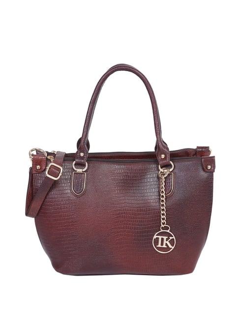 teakwood leathers maroon textured medium handbag