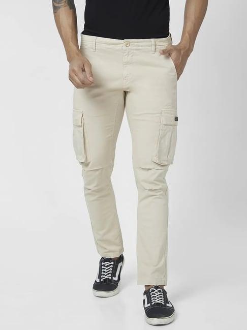 spykar ecru cotton tapered fit cargos