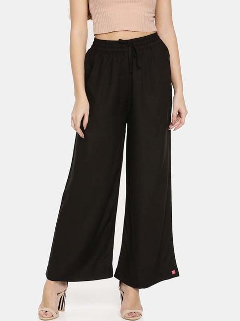 twin birds black mid rise palazzos