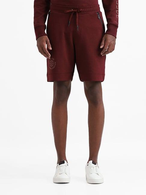 studiofit by westside solid wine melange relaxed fit shine shorts