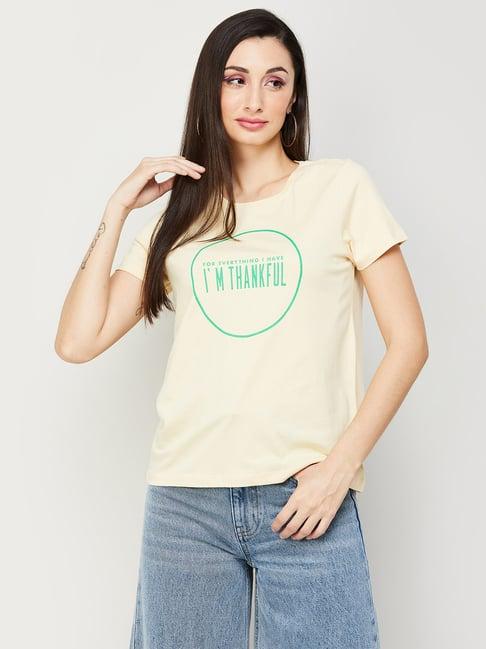 fame forever by lifestyle yellow cotton graphic print top