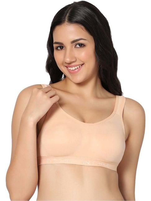 in care peach sports bra