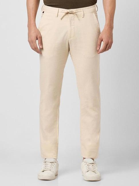 peter england casuals beige slim fit trousers