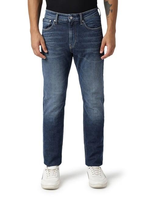 calvin klein jeans tapered fit denim dark jeans