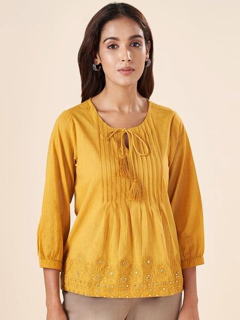 akkriti by pantaloons mustard cotton embellished tunic