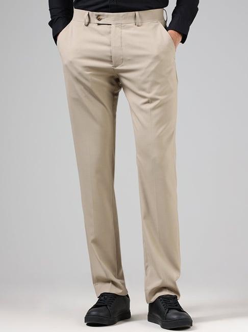 wes formals by westside solid light khaki relaxed fit trousers