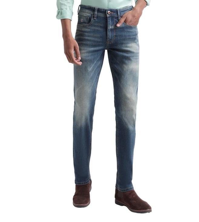 iconic slim blue washed mid rise jeans