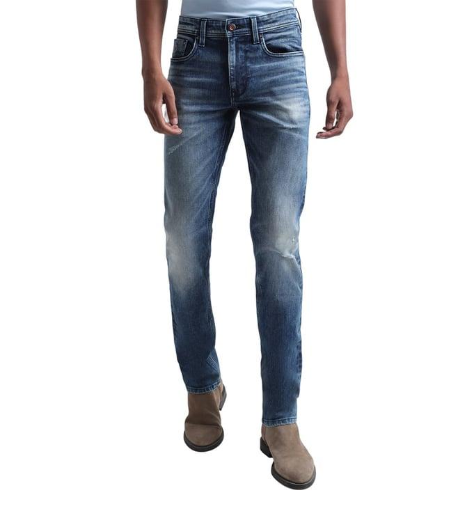 iconic slim blue washed mid rise jeans