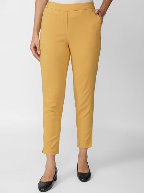 van heusen yellow mid rise formal trousers