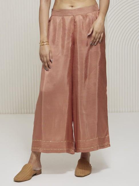 artagai salmon pink palazzo with pin tucks and embroidery at hemline