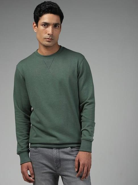 wes casuals by westside solid dark green ribbed relaxed fit sweatshirt