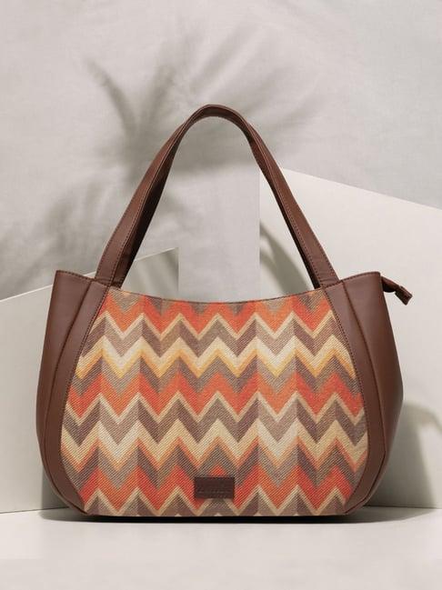 zouk tidal wave orange printed luna shoulder bag