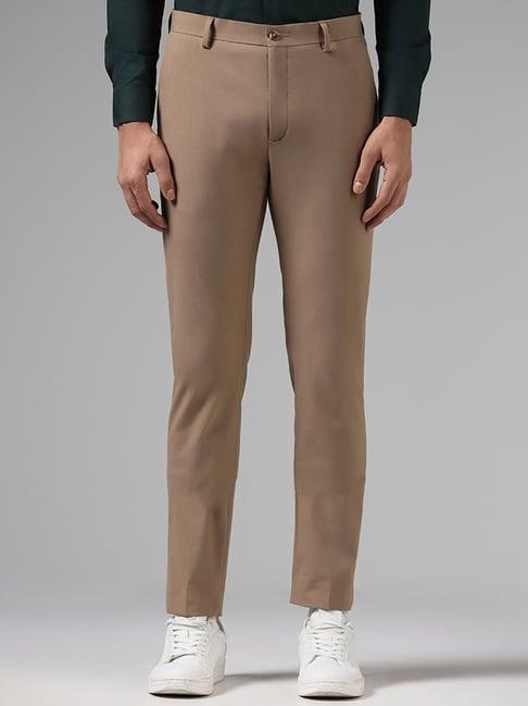 wes formals by westside solid dark khaki ultra slim fit trousers