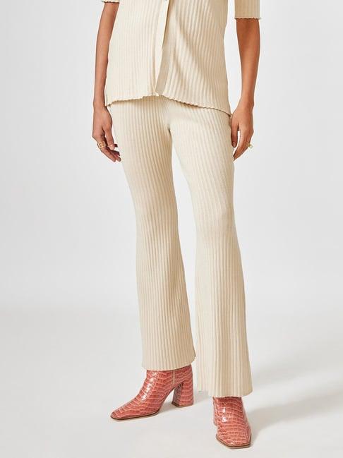 the label life cream regular fit mid rise pants