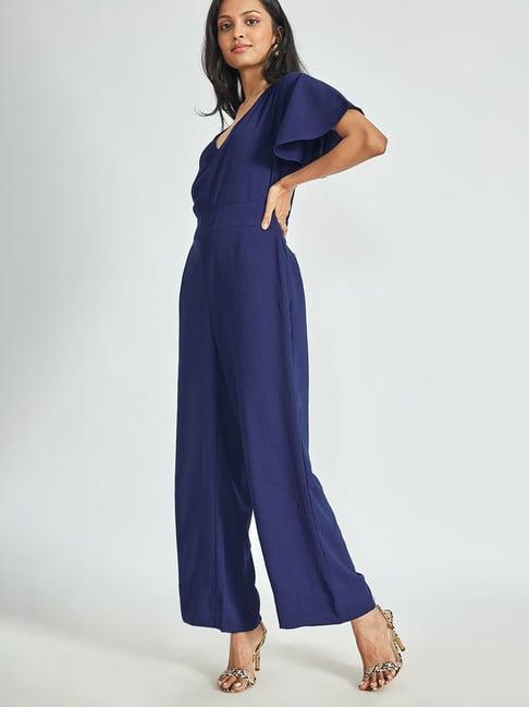 the label life blue jumpsuit