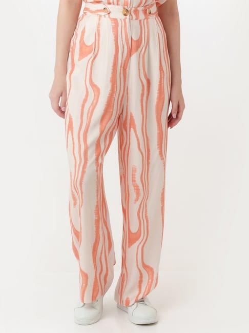 zink london white & peach printed regular fit high rise trousers