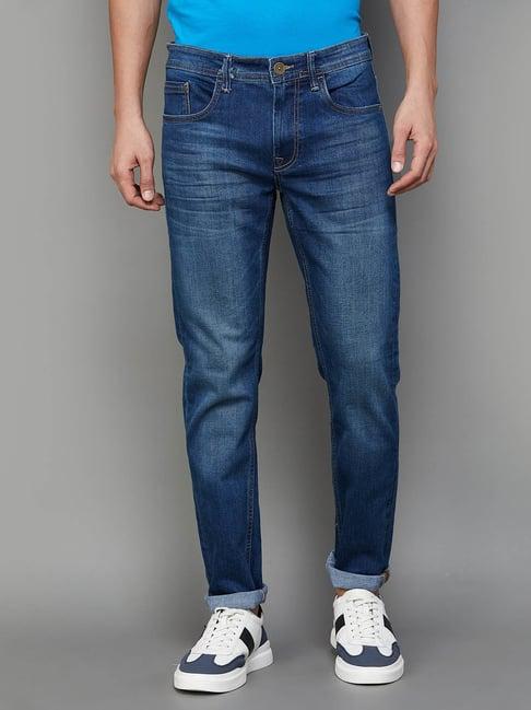 forca by lifestyle mid blue cotton slim tapered fit jeans