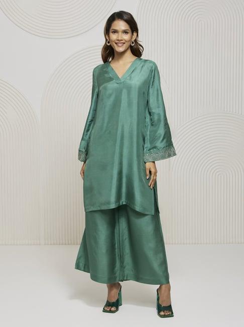 artagai teal green kurta with overlap v neckline and flare sleeves