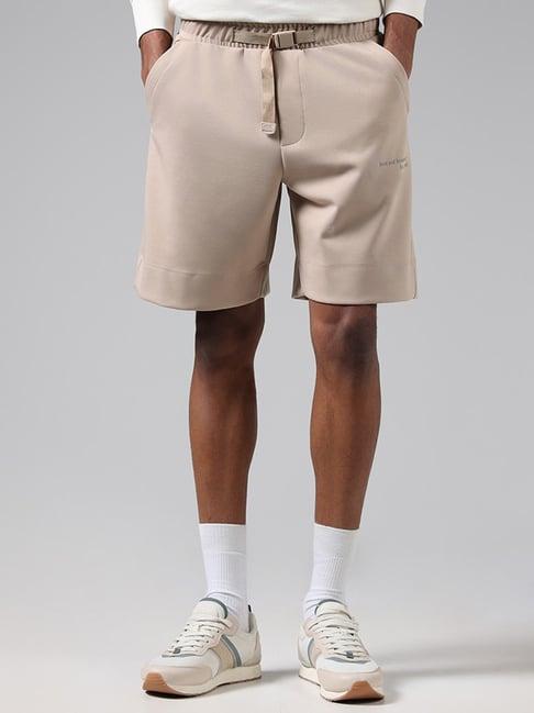 studiofit by westside beige typographic relaxed fit running shorts