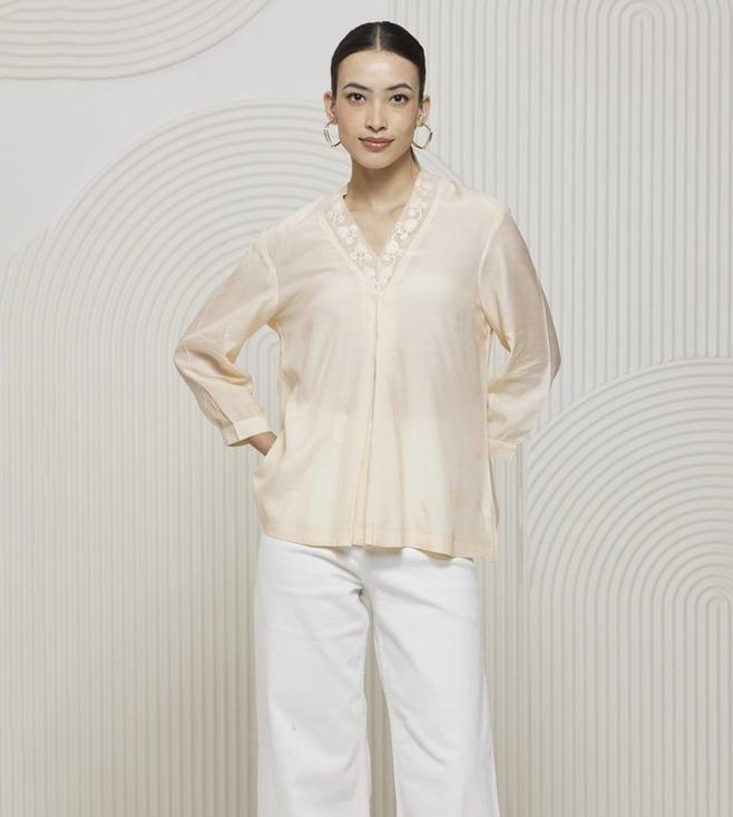 artagai shell kashida v-neck top with kashida embroidery on sleeves