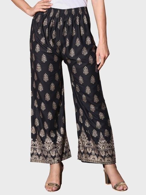 buynewtrend black printed palazzos