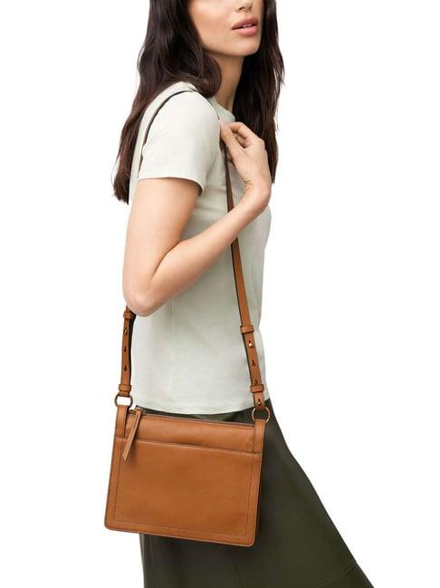 fossil taryn brown leather solid sling handbag