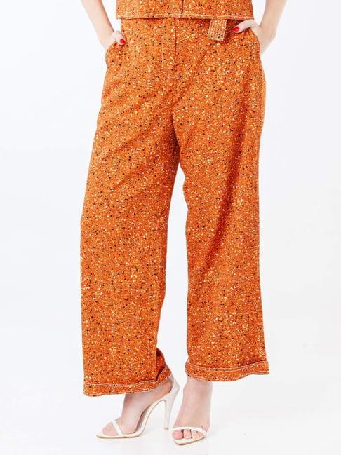 zink london orange printed flared pants