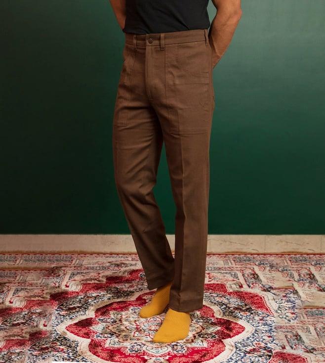 artless muddy brown trousers