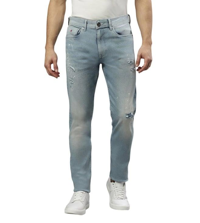 iconic slim tapered blue washed ripped mid rise jeans