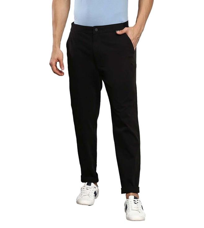 calvin klein black solid slim fit trousers