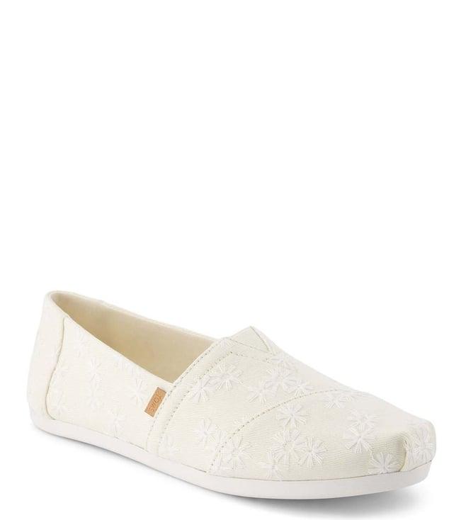 toms women's natural slip on sneakers