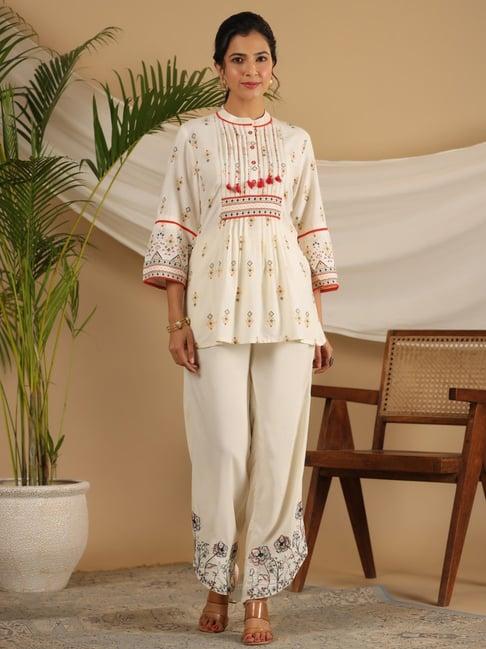 juniper rayon ivory tribal printed a-line pleated co-ord set with sequenced thread work