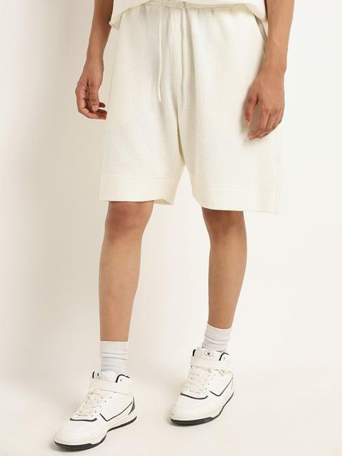 studiofit by westside off-white solid relaxed fit shorts