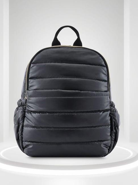 fastrack black faux leather quilted backpack