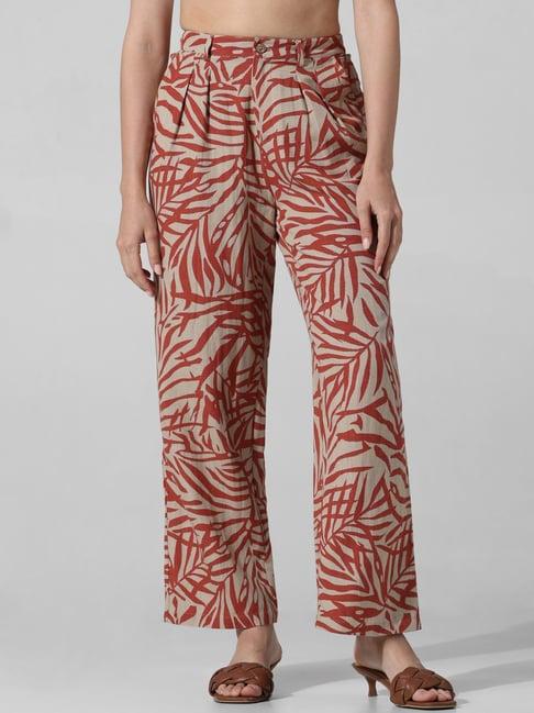 only beige & red printed regular fit high rise pants