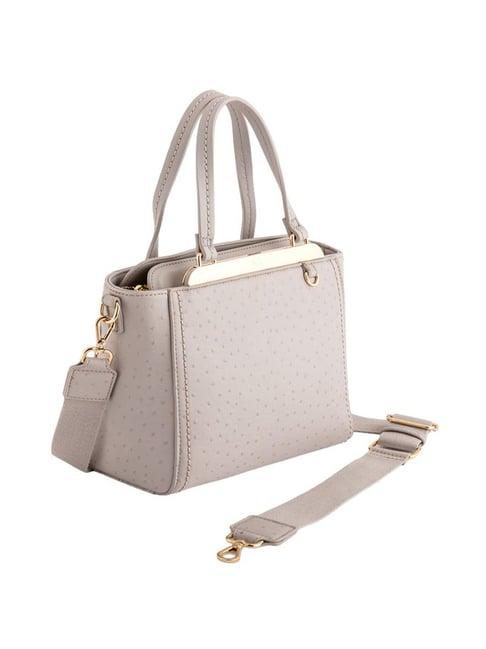 carpisa diva v2 pearl faux leather solid handbag