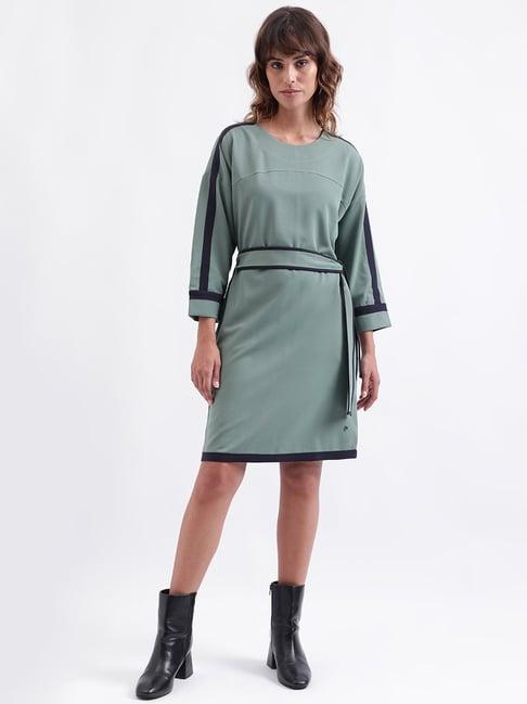 iconic green shift dress