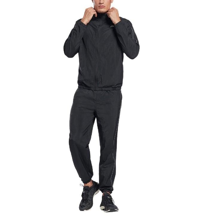 reebok black regular fit tracksuits