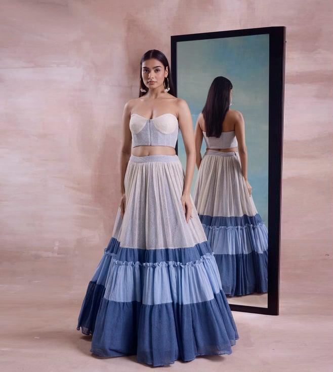 shwetanga ivory & cerulean tarang layered lehenga with corset top