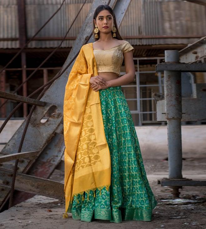 rangpur green lehenga with golden banarasi blouse and dupatta