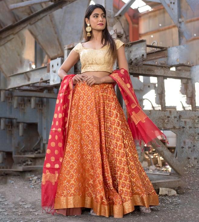 rangpur orange and red lehenga with blouse and dupatta