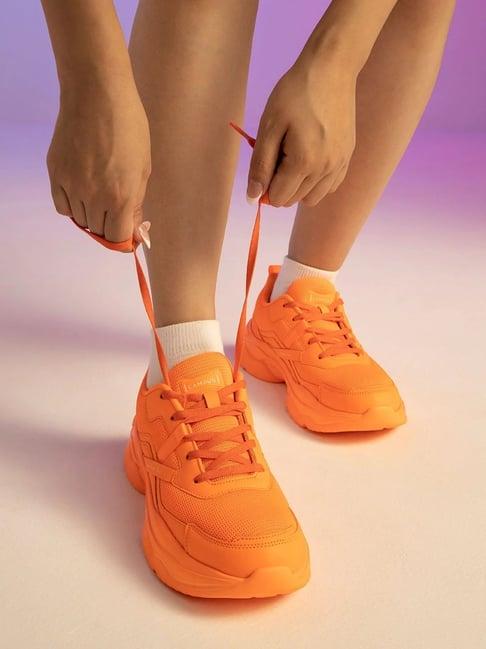 campus women's raise orange running shoes