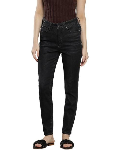 calvin klein skinny black lightly washed mid rise jeans