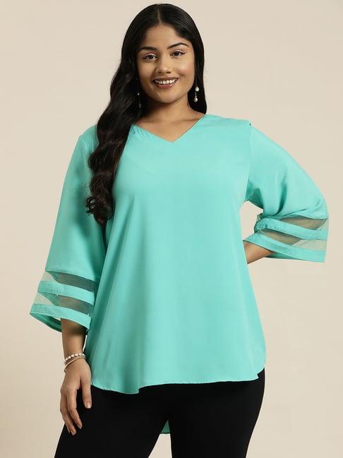 qurvii + turquoise top