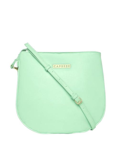 caprese ruhee mint faux leather solid sling handbag